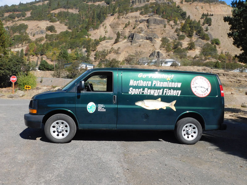 Image of Northern Pikeminnow Sport-Reward Program van at the Bingen Marina area.