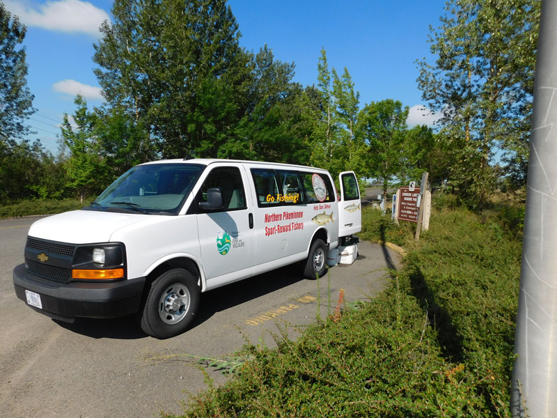 Image of Northern Pikeminnow Sport Reward Program van at the Chinook Landing.