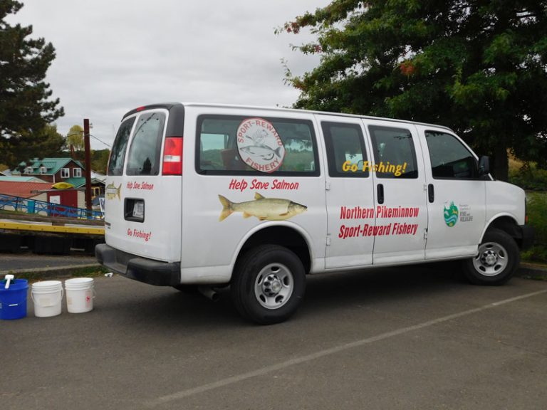 Image of Northern Pikeminnow Sport Reward Program van at the Ridgefield Marina.