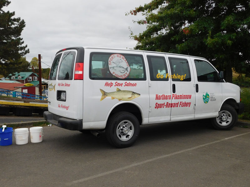 Image of Northern Pikeminnow Sport Reward Program van at the Ridgefield Marina.